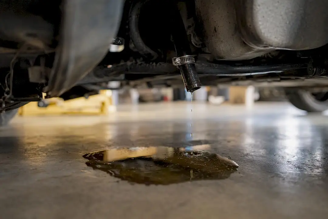 Power steering fluid drip under engine bay hose
