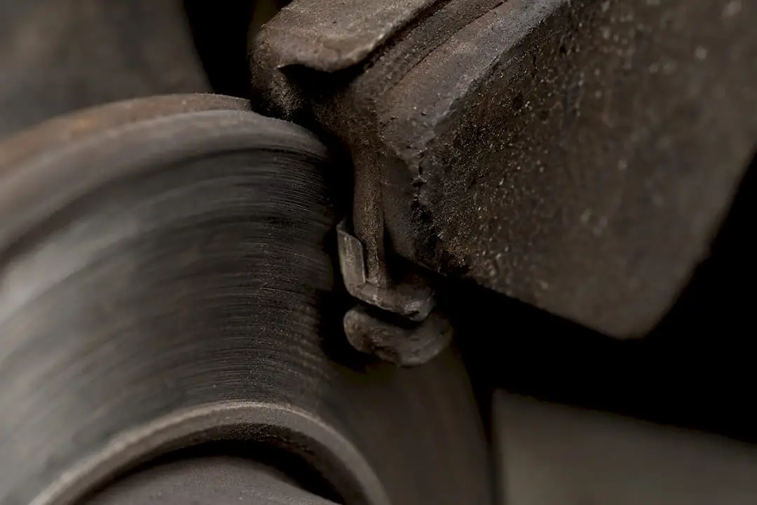 Close-up worn brake pad wear indicator tab