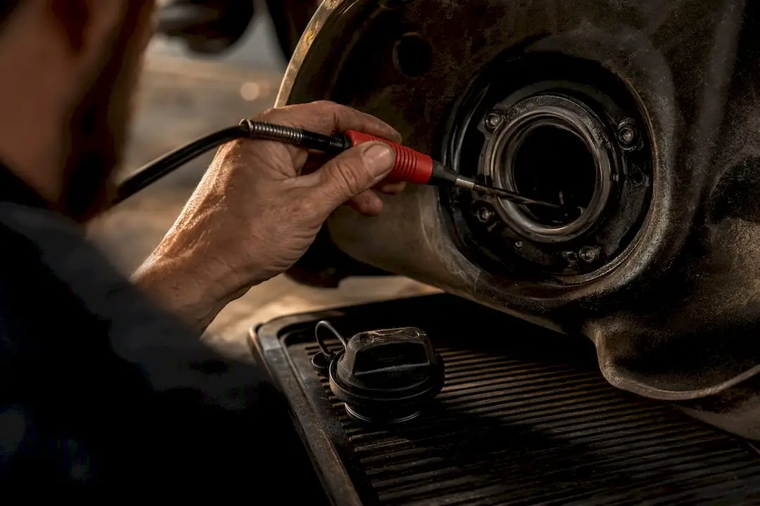 HC sniffer checking vehicle fuel filler